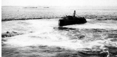 The German U3503 surfacing at the salvage operation August 1946 outside Gothenburg. 